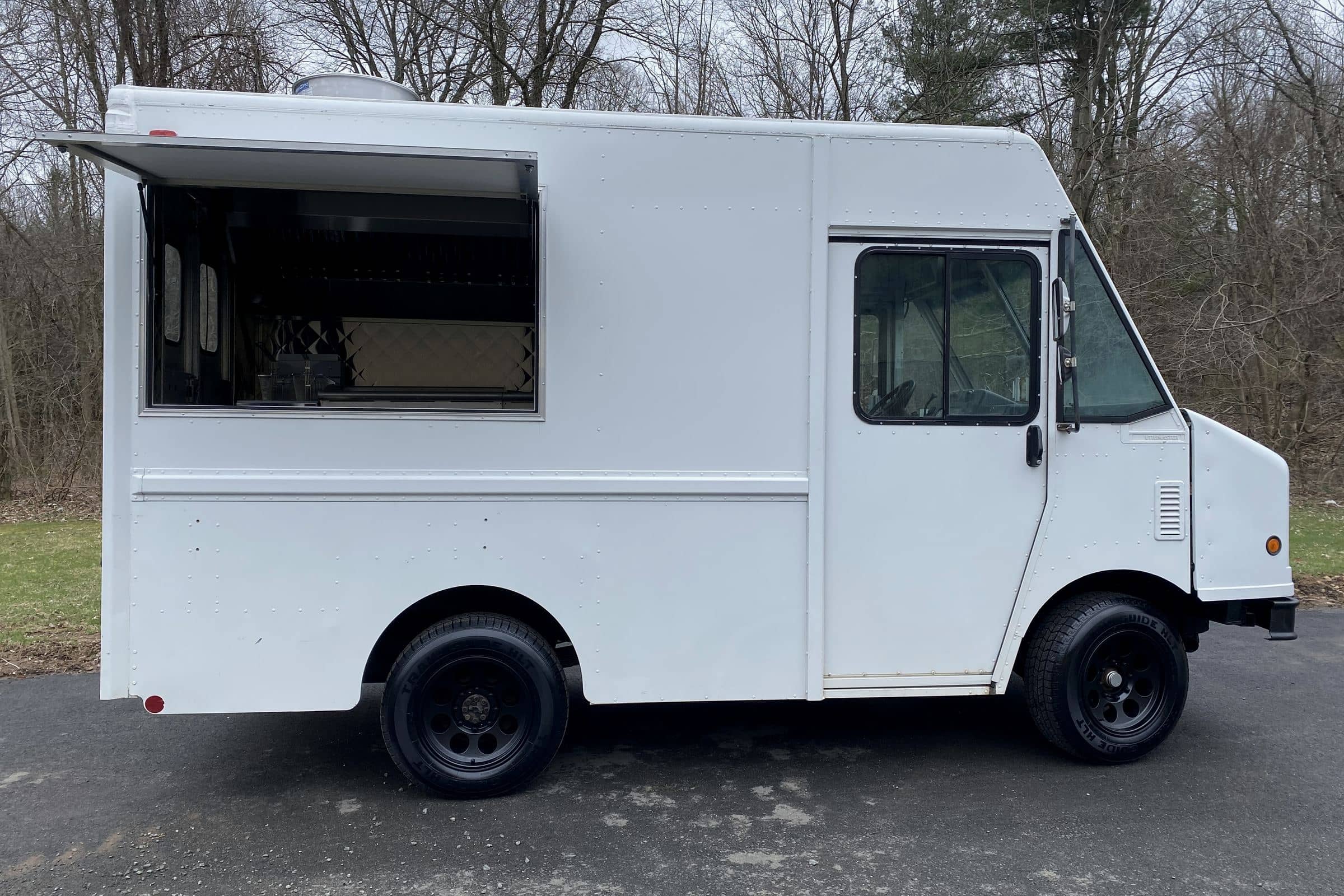 White Cliffton Truck step van with the serving window open