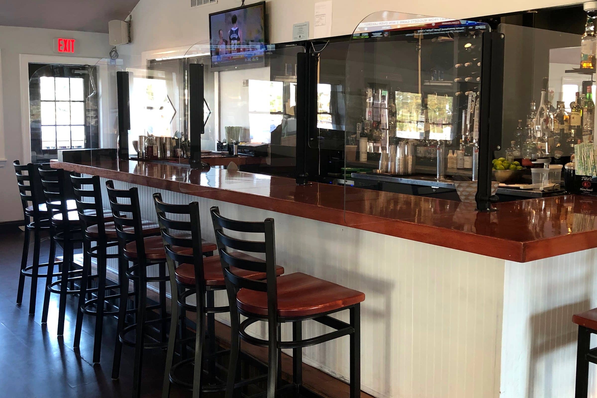 Removable Lexan bar dividers at Nellie's