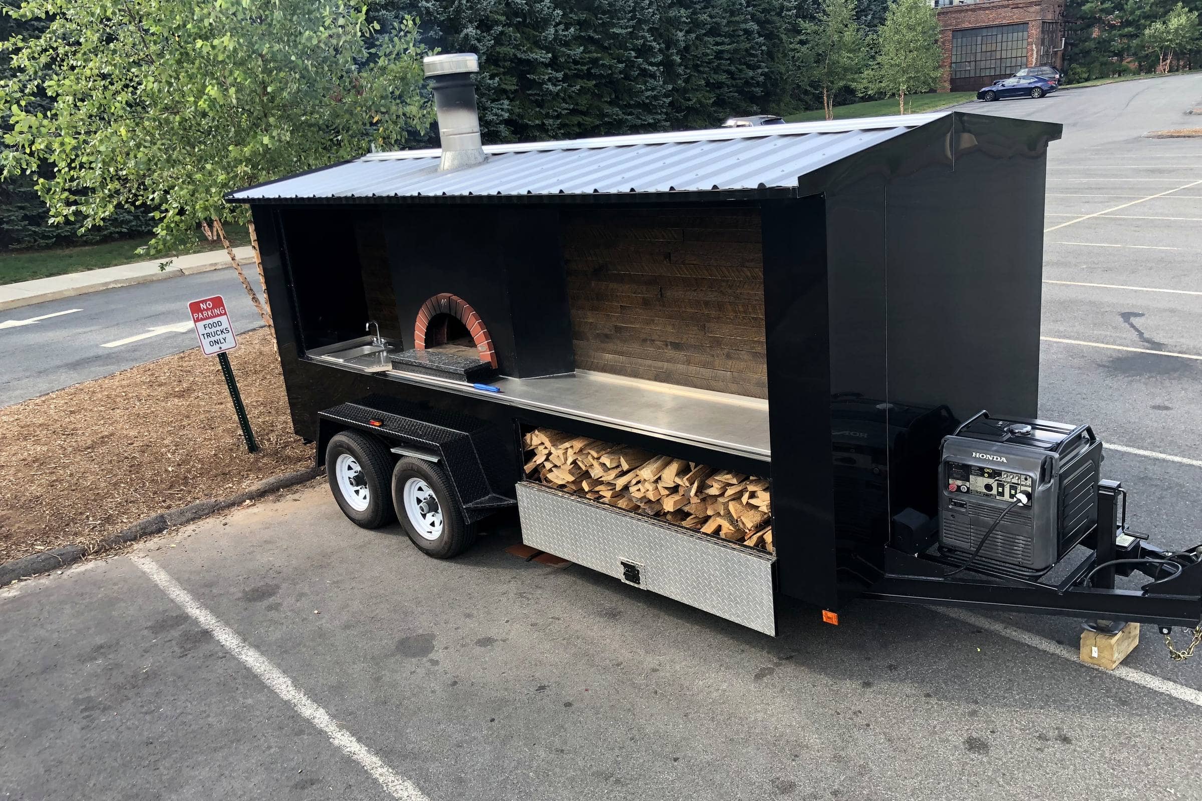 The Fire Pizza Company trailer with Valoriani 120 oven and wood storage